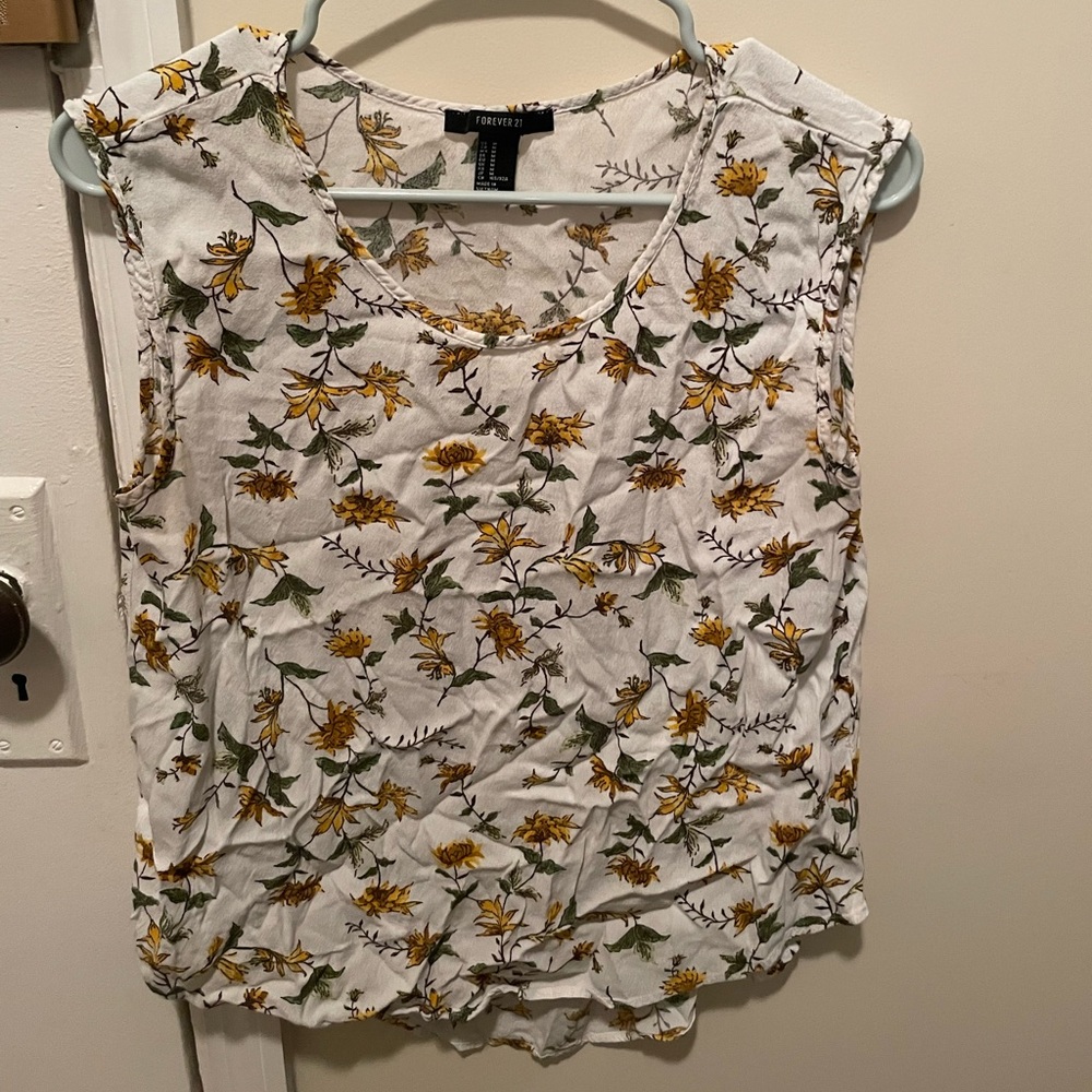 White top with yellow floral details